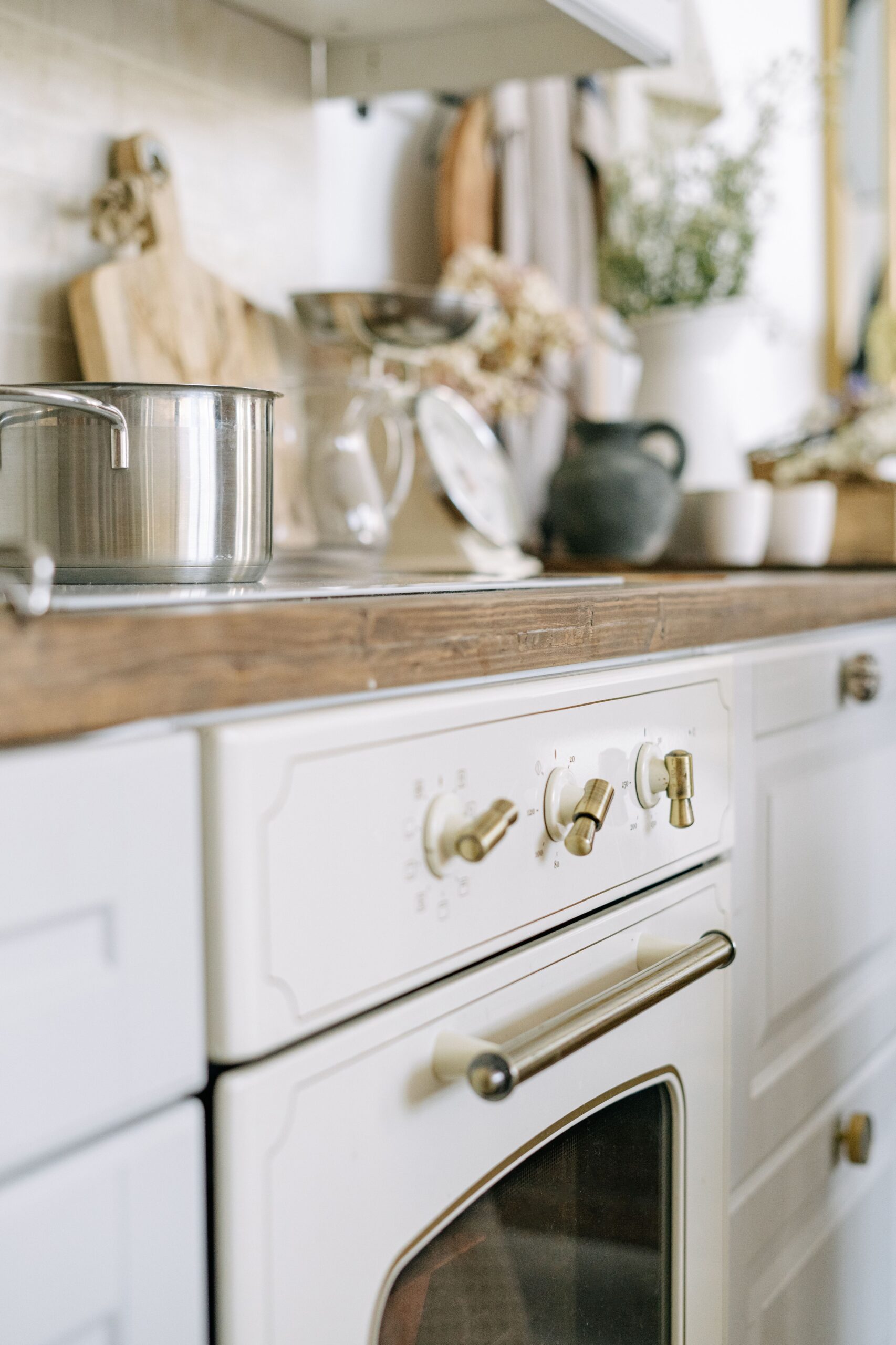 White cottage kitchen with a vintage stove