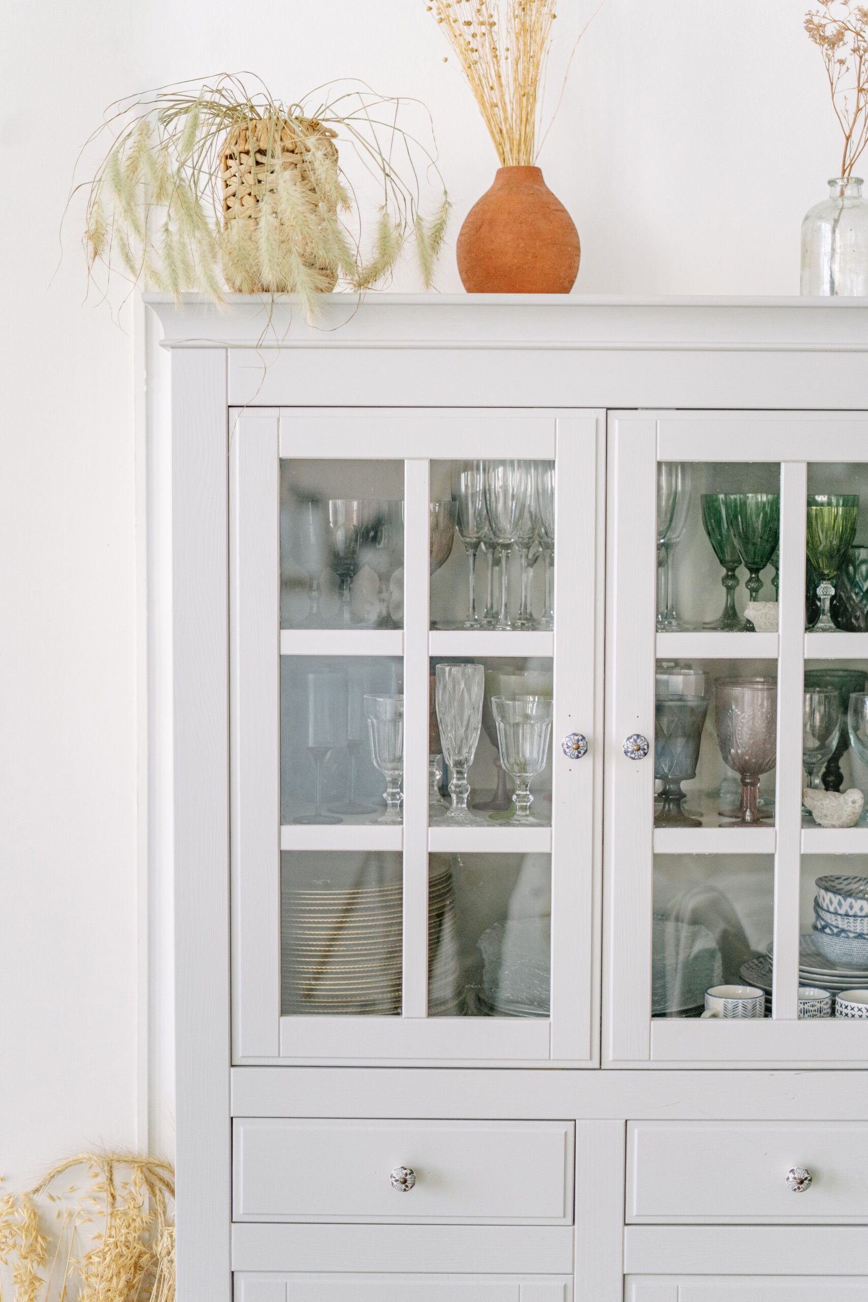 White glass-front cabinet